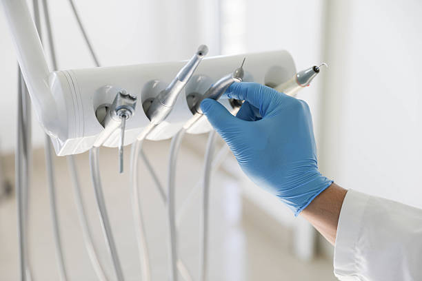 Professional Root Canal Treatment technician working in Buncombe County County, NC